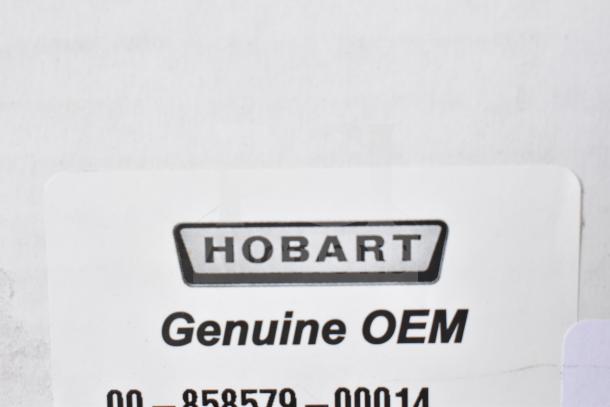 Label reading "Hobart Genuine OEM" on a box containing new scratch and dent items: thermocouple, control board, pilot assembly.
