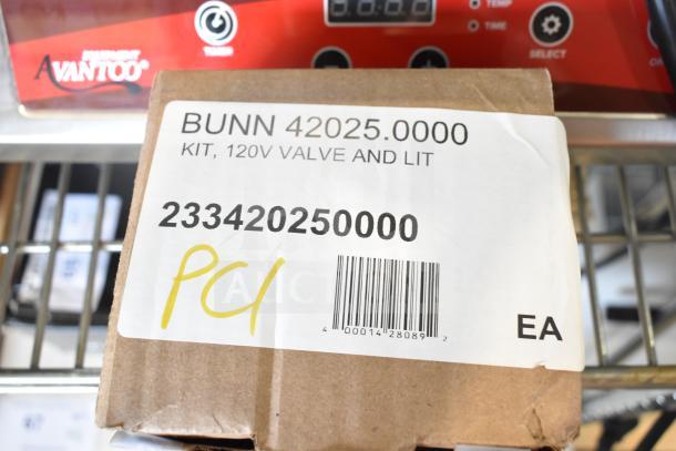 Brown box labeled "Bunn 42025.0000, Kit, 120V Valve and Lit" with barcode and "PCI" in yellow marker.