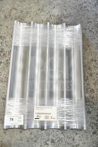 Brand new 176BAGPAN4AS 4-loaf glazed aluminum baguette pan, 26"x3 7/8"x1" compartments. Scratch and dent condition.