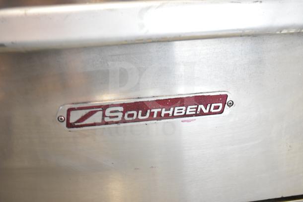 Southbend Commercial Gas Range with 6 Burners, Oven, and Back Splash. Features Southbend logo plate.