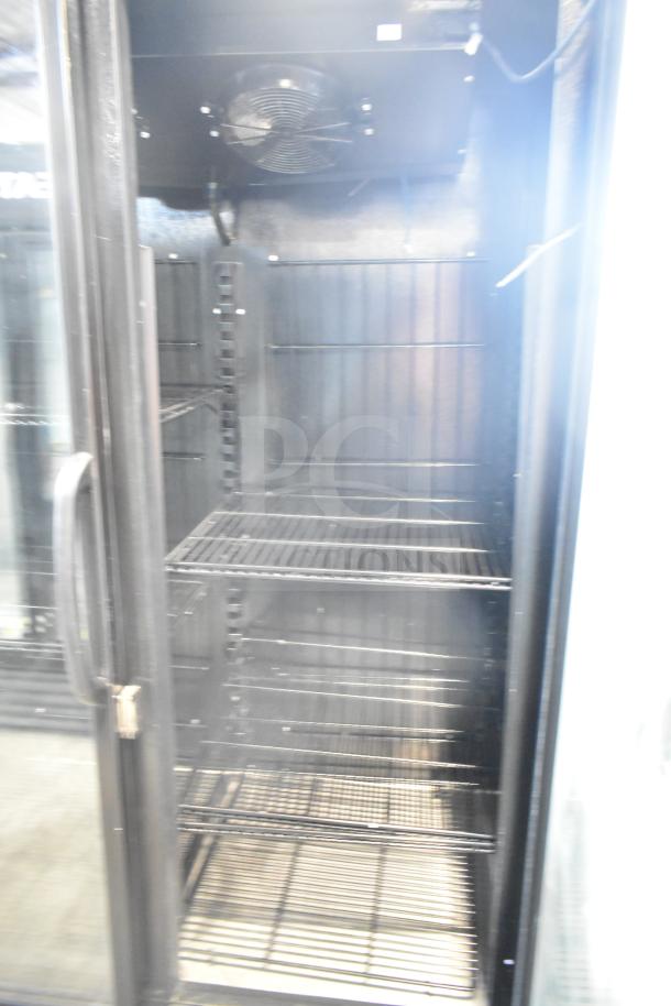 Master-Bilt BLG-48-HGP commercial freezer, 2-door, reach-in, adjustable shelves, 115/208-230 volts, 1 phase, good condition.