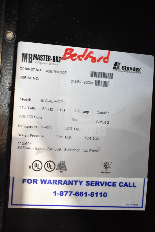 Master-Bilt BLG-48-HGP freezer label showing model, power specs, refrigerant type, pressure, and warranty service info.