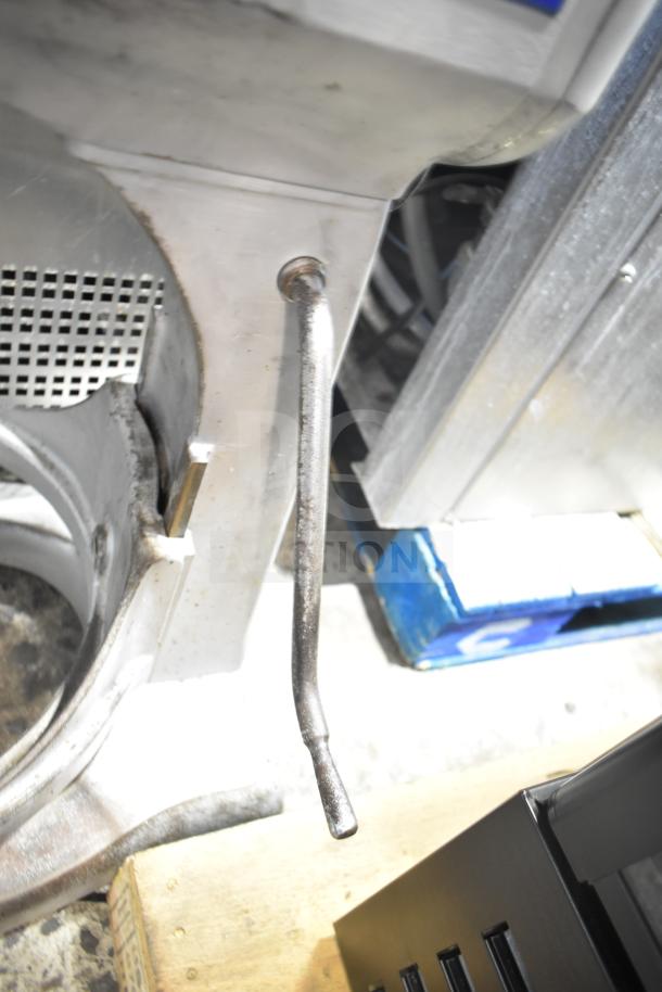 Hobart A200 20 Quart Planetary Dough Mixer, showing a close-up of a metal component on the mixer body.