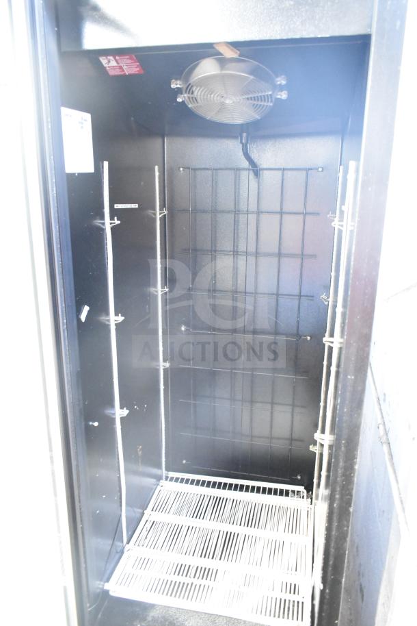 Master-Bilt IM-23GB commercial freezer, single door, reach-in model, interior view, includes shelving and fan, 115/208-230 volts.