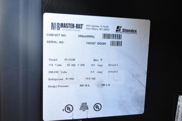 Label on Master-Bilt IM-23GB freezer showing specs: 115/208-230V, 1 Phase, R-134a refrigerant, UL listed.
