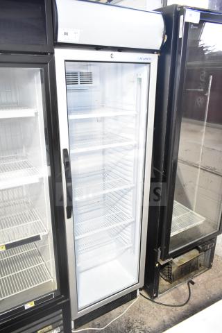 Atlantic USS 374 DTKL commercial single door reach-in cooler, 115 volts, 1 phase. Features adjustable shelves.