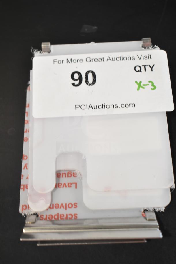 Three brand new, scratch and dent Cal-Mil 1807N notched plastic lids with stainless steel hinges. Auction tag shows "90 QTY X-3".