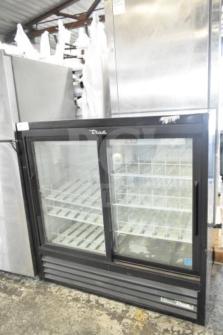 True GDM-41SL-48-HC-LD commercial 2-door reach-in cooler with glass doors and brand logo, in good condition.