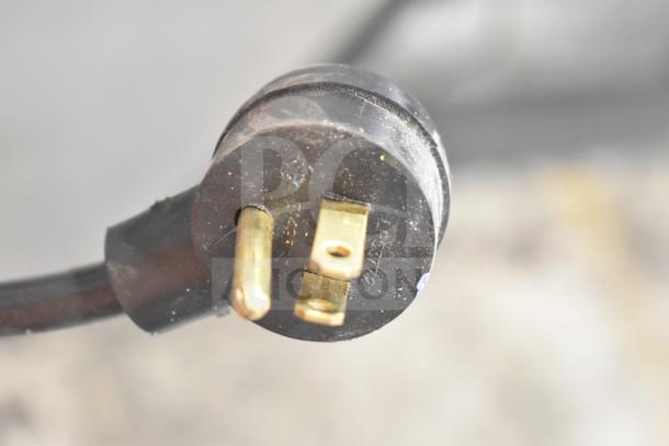 Power plug of Habco ESM12 single door cooler, 115 volts, indicating electrical compatibility. Clean and intact condition.