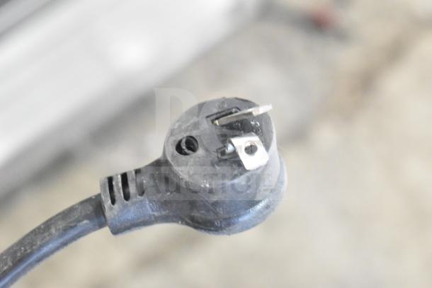 Power cord of the 2021 True T-19F-HC Commercial Freezer, 115V, 1 Phase, showing three-prong plug condition.