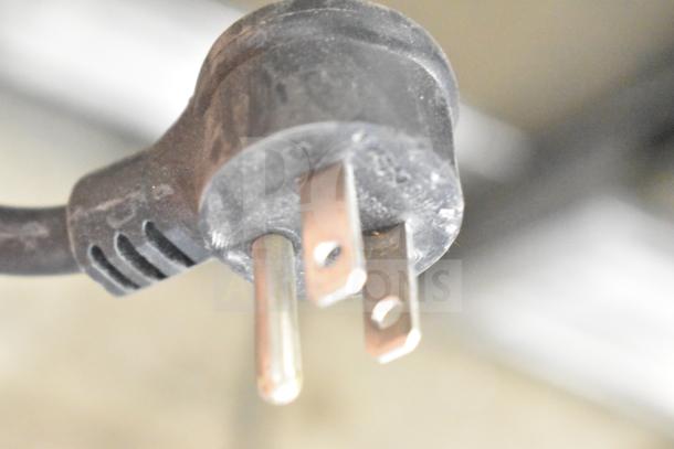 Close-up of a power plug for the 2020 True T-19F-HC commercial freezer, 115 volts, 1 phase.