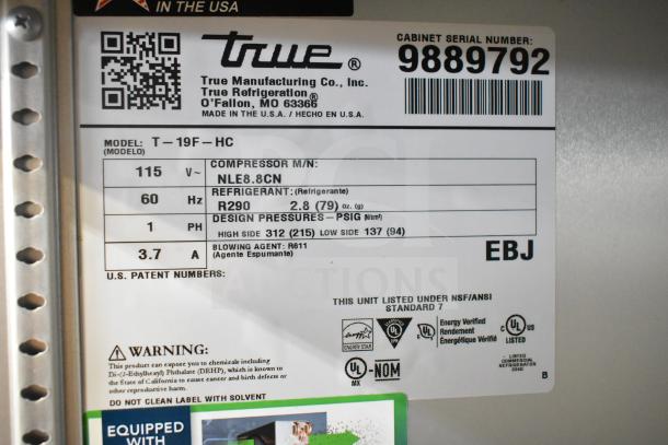 2020 True T-19F-HC commercial single-door freezer on casters, 115V, 1 phase, model tag with specs and serial number.