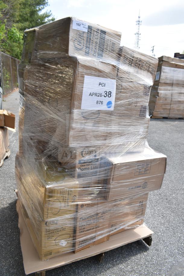Plastic-wrapped pallet with boxes labeled "Dome Lids" and other items. Includes gloves, caps, containers. New, scratch and dent.