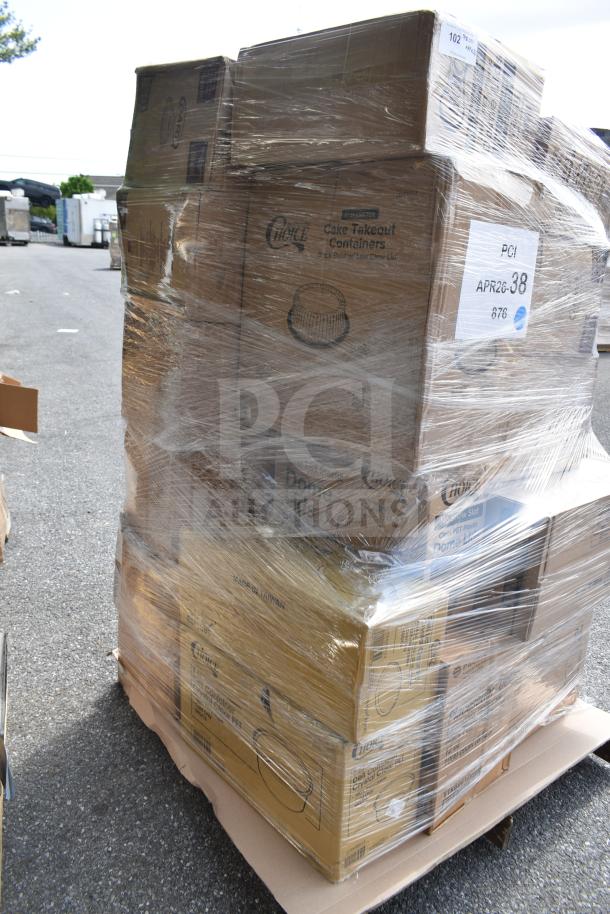 Plastic-wrapped pallet of new scratch-and-dent items—gloves, bouffant caps, containers. Marked "PCL APR26-38."