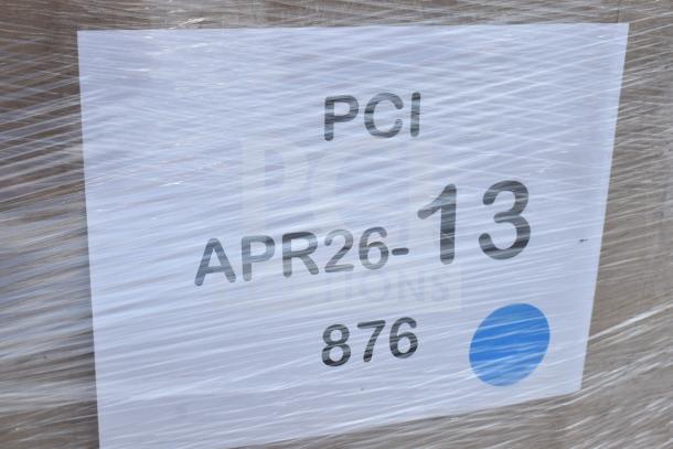 28 scratch and dent items including flat lids, cups, containers; label reads "PCI APR26-13 876", wrapped in plastic.