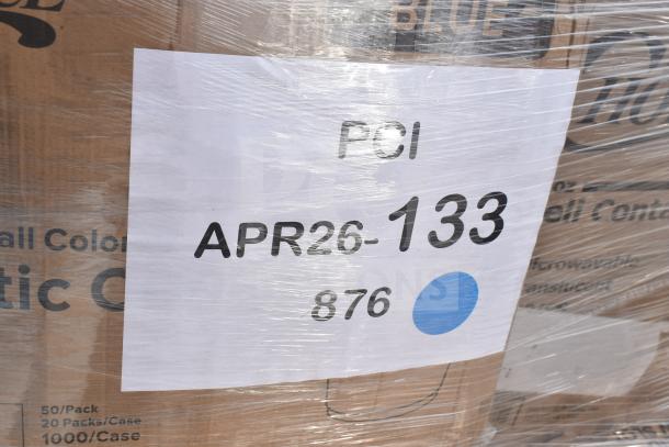Clear wrap on cardboard box displaying label "APR26-133" indicating 26 new scratch and dent items including cups, bags, glasses.