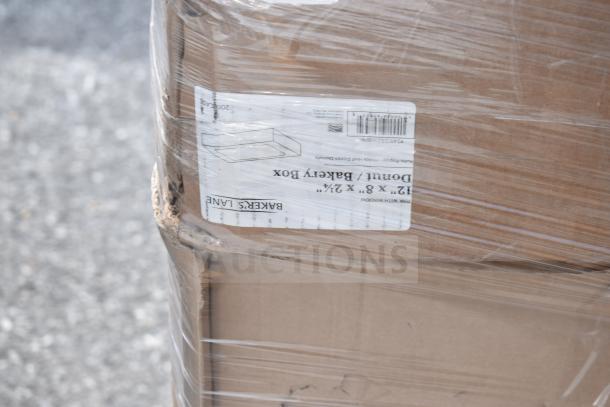 Palette of 24 brand new bakery boxes, 12"x8"x2¼", sealed in shrink wrap. Some scratch and dent visible. Marked as "Baker's Lane".