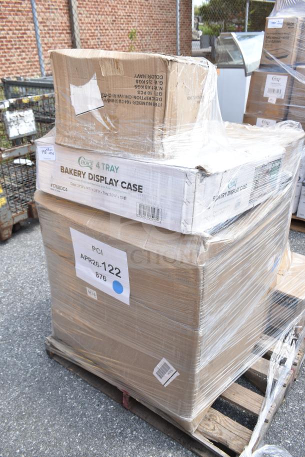 Pallet of scratch and dent items, including a Choice 4-tray bakery display case, wrapped in plastic with visible labels APR26-122.