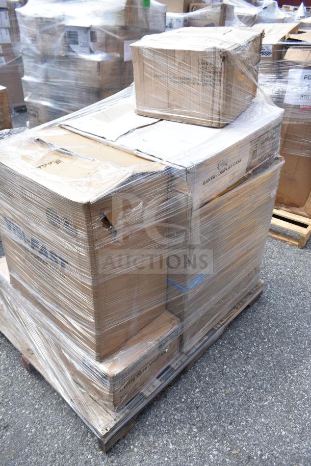 Pallet with five new scratch and dent items, including utility shelf and Chiavari chair cushions, wrapped in plastic.