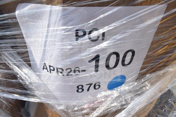 Bundle of new scratch and dent items, including mini taco holders and fryer baskets, wrapped with a visible PCI APR26-100 label.