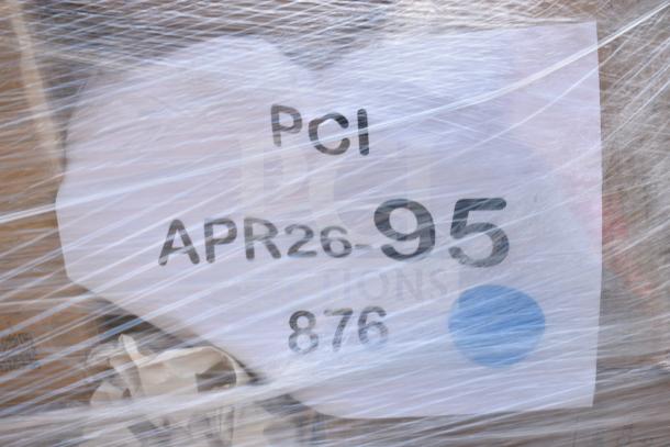 38 brand new scratch and dent items wrapped in plastic, label reads "PCI APR26-95 876." Includes plates, glasses, containers.