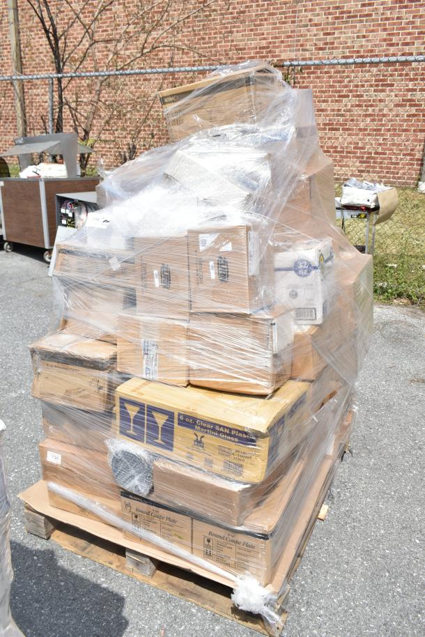 Plastic-wrapped pallet of 38 brand new scratch and dent items, including boxed plates, glasses, and containers. Various labels visible.