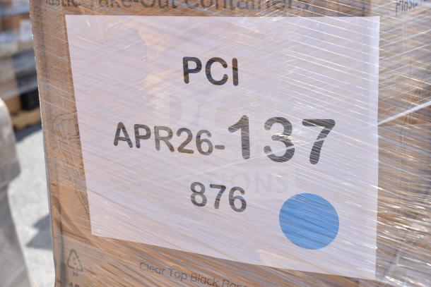 Pallet wrapped in plastic with label "PCI APR26-137 876," containing new scratch and dent items like vacuum pouches and bags.