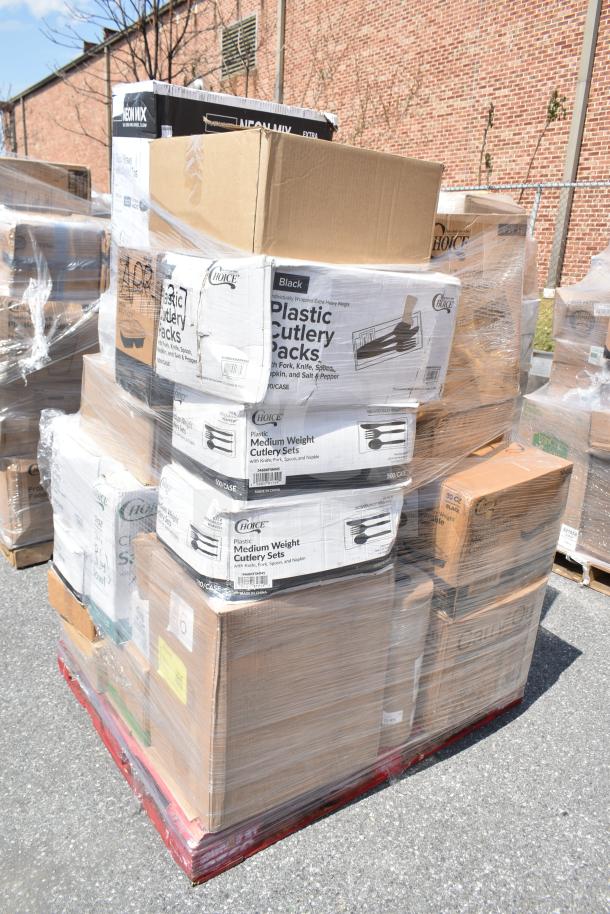 Stack of brand new items on pallet, including boxed plastic cutlery packs and vacuum packaging pouches, wrapped in plastic.