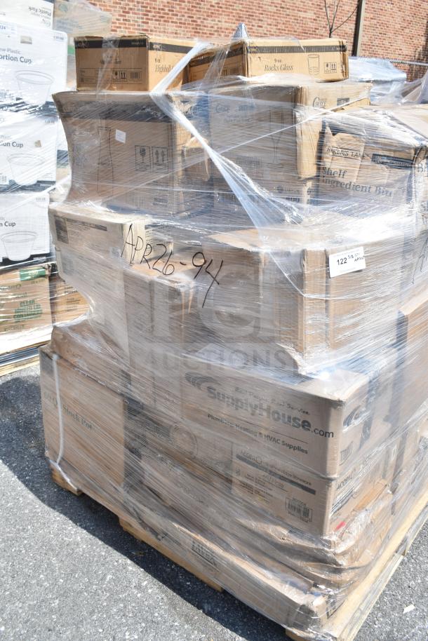 Shrink-wrapped pallet of 37 new scratch and dent items, including plates, rocks glasses, ingredient bin. Labeled "APR26-94".