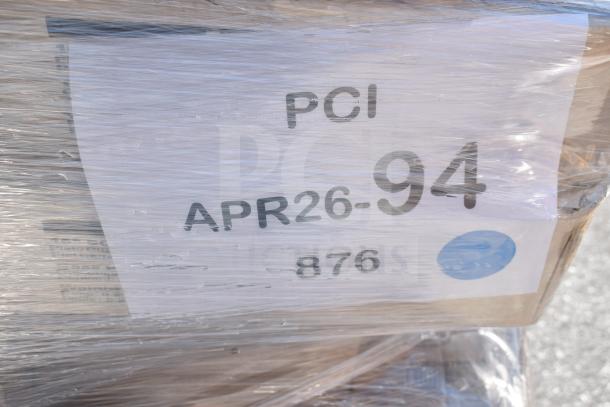 Plastic-wrapped pallet marked "PCI APR26-94", containing 37 new scratch and dent items including plates and glasses.