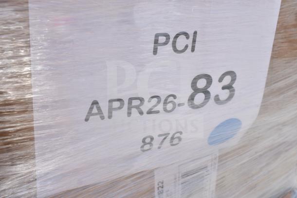 Plastic-wrapped pallet labeled "PCI APR26-83" containing 32 brand new scratch and dent items like food cups and tumblers.