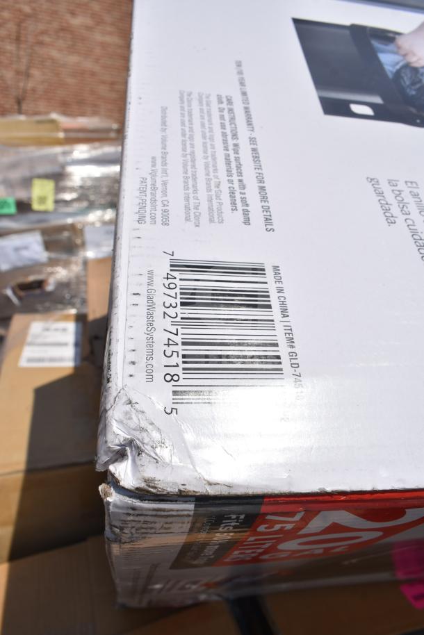 Damaged corner of retail box showing barcode and product label for item #GLD-74518. Box has visible dents and scratches.