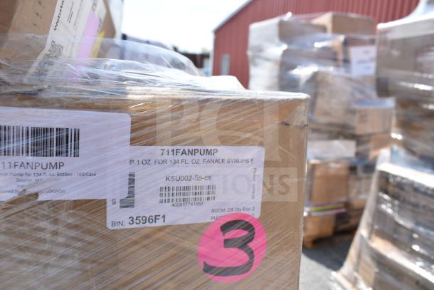 Boxes wrapped in plastic with visible labels, including "711FANPUMP" and "3596F1." Items are scratch and dent condition.