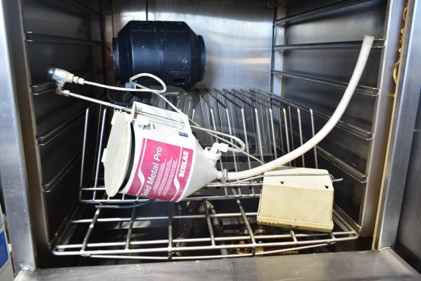 LVO FL14E stainless steel commercial pot and pan washer, front load, 460 volts, 3 phase, interior view.