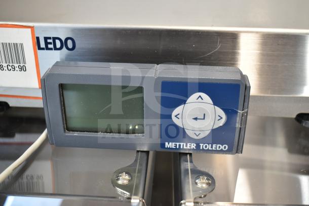 Mettler Toledo BC commercial countertop food portioning scale with digital display and control buttons, excellent condition.