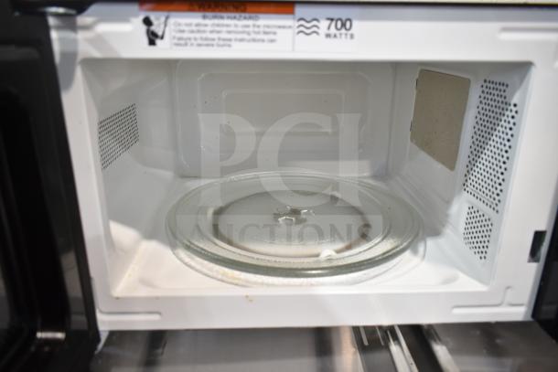 Hamilton Beach MS8436127995-01 countertop microwave, brand new with minor scratches. 120 Volts, 700 Watts, glass turntable.