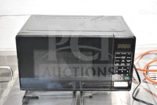 BRAND NEW 2025 Hamilton Beach MS8436127995-01 microwave, 120V, with minor scratches and dents, digital keypad, black finish.