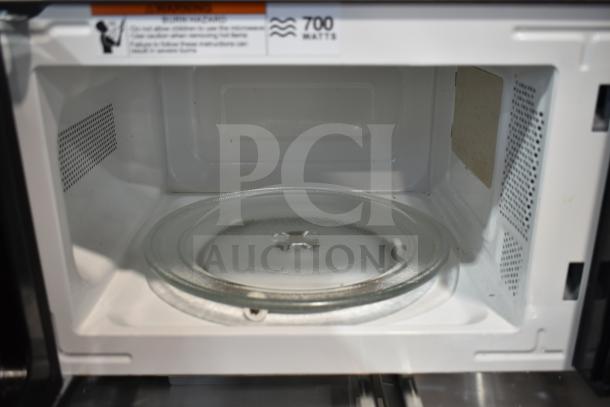 Brand new Hamilton Beach MS8436127995-01 microwave, 700 watts, 120V, scratch and dent model.