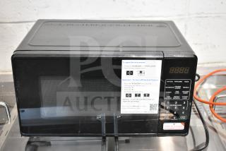 BRAND NEW 2025 Hamilton Beach MS8436127995-01 countertop microwave, 120V, 1 phase. Visible label shows control instructions.