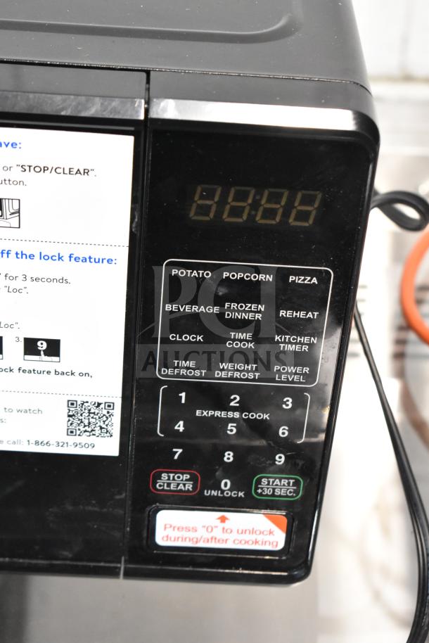 BRAND NEW Hamilton Beach MS8436127995-01 microwave with scratch and dent. Features pre-set functions and digital display.