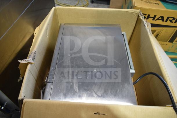 2023 Sharp R-21LVF commercial microwave, stainless steel, in box. Features: 120 volts, 1 phase. Visible surface scratches.