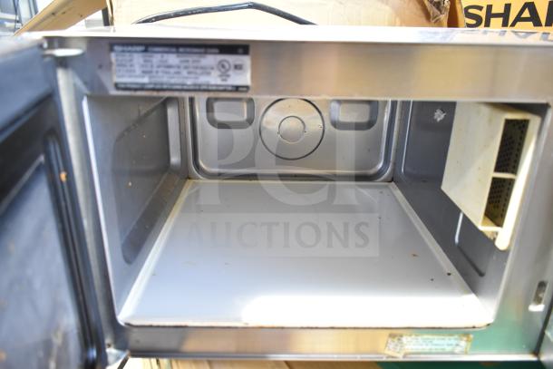 2023 Sharp R-21LVF commercial countertop microwave oven, stainless steel, 120 volts, used condition, interior view.