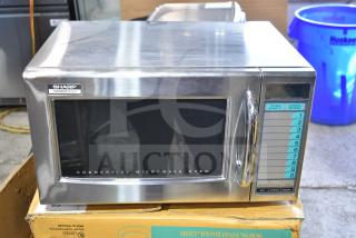 2024 Sharp R-21LVF commercial countertop microwave oven, 1000W, stainless steel, keypad controls, excellent condition.