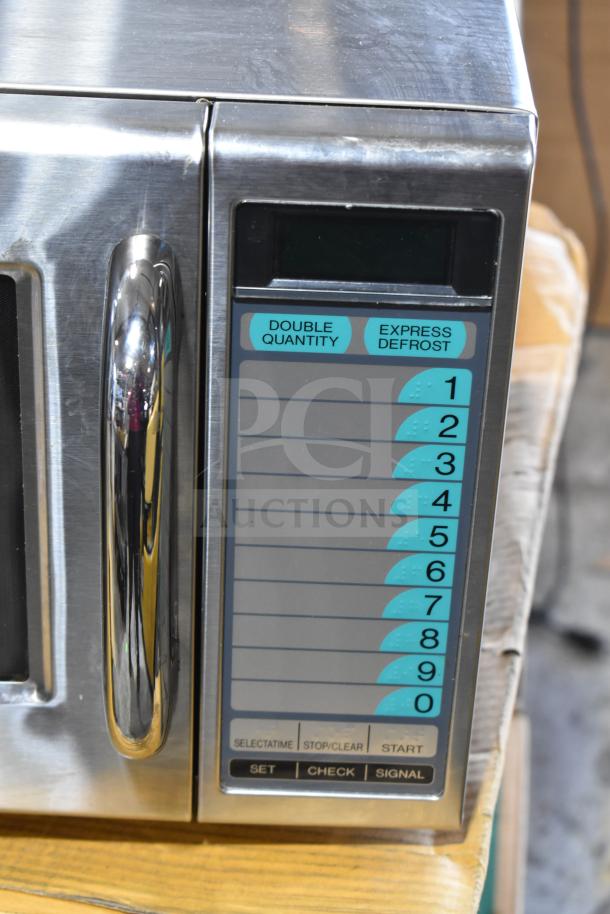 2024 Sharp R-21LVF Commercial Microwave Oven with digital keypad, 120 volts, 1 phase, stainless steel exterior, excellent condition.