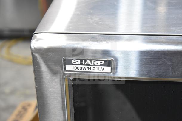 2024 Sharp R-21LVF Commercial Microwave Oven, stainless steel, 120V, 1 phase, model label visible, excellent condition.