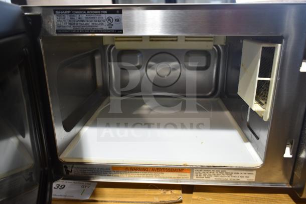 2024 Sharp R-21LVF Commercial Microwave Oven, 120 Volts, 1 Phase, stainless steel, label shows model info, good condition.
