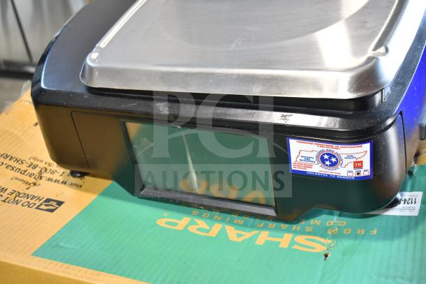 2016 Hobart HTi-7LH commercial food portioning scale, brushed metal top, tested working, voltage 120/208-240, 1 phase.