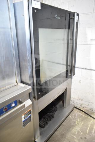 Fri-jado TDR7-P commercial electric rotisserie oven on casters, 208V, 3-phase, stainless steel, glass door, used condition.