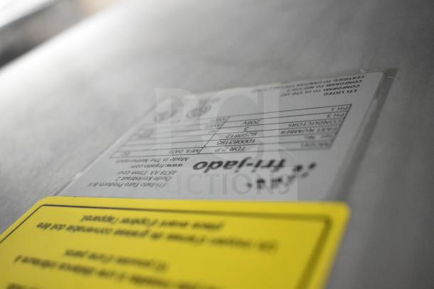 Fri-jado TDR7-P electric rotisserie oven label showing 208V, 3 Phase details, on commercial casters, model TDR7-P.