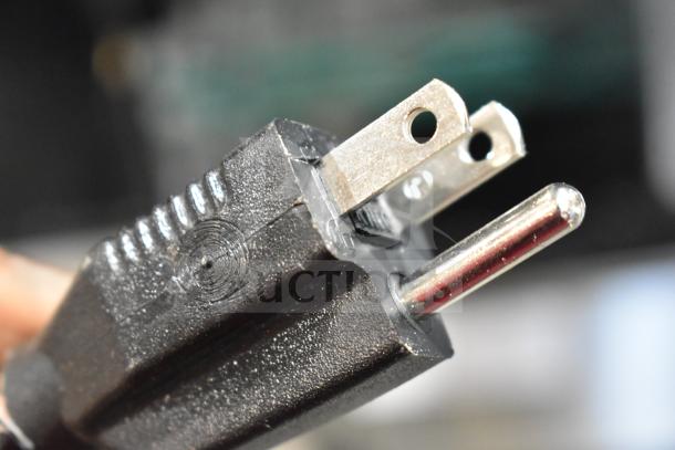 Close-up of a power plug for an Oliver 797-32NC Commercial Bread Slicer, 115 Volts, 1 Phase.